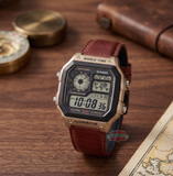 Casio digital watch with brown leather strap on a wooden surface