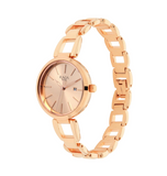 Titan Raga Rose gold watch with a chain-like bracelet on a white background