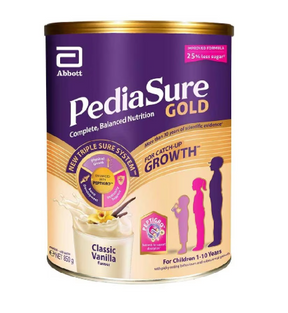PediaSure Gold container with purple and gold design on a white background